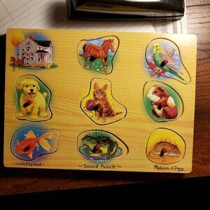 Sound puzzle. Melissa and Doug wooden puzzle,